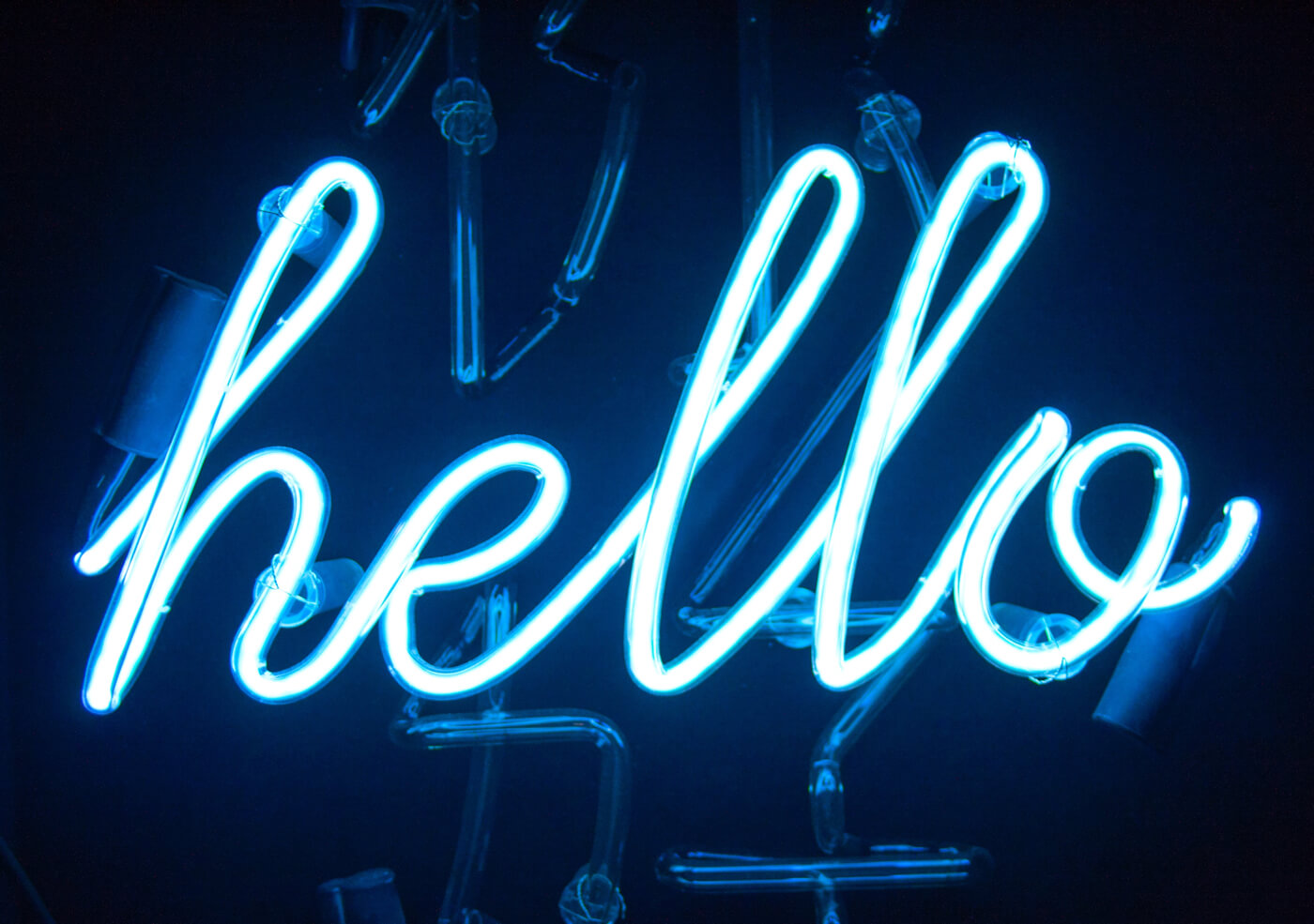 a neon sign 'hello'